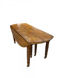 1800s oval drop leaf table in Louis Philippe rustic style extendable walnut wood