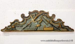 Antique hand-painted pediment with various tools of a master carpenter whose Patron Saint was Saint Joseph