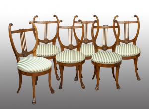 Group of six antique Lucchese Empire chairs in solid walnut. 19th century.