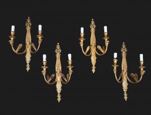 Set of four Napoleon III gilt bronze appliques. France, 19th century.