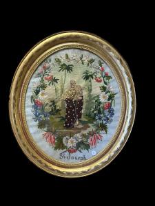 Painting depicting Saint Joseph embroidered in petit point from the 1800s