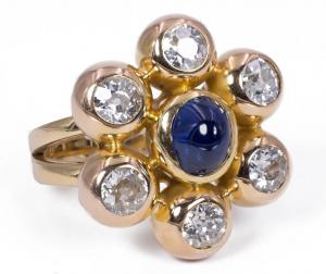 Vintage 18k gold ring with approximately 3ct of diamonds and cabochon sapphire, 1980s.