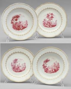 Two flat plates and two soup plates in Ginori porcelain, blood-red decoration with landscapes, 18th century