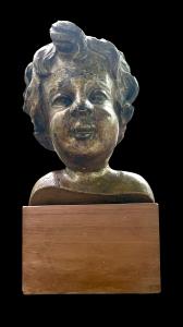 Busto di bambino in legno intagliato e dorato a mecca.