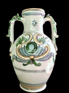 Two-handled majolica vase with rocaille decoration and stylized plant motifs. Caltagirone, Sicily.