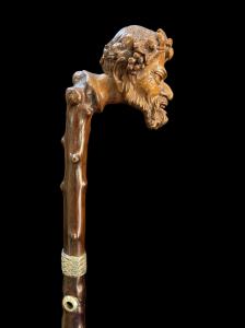 Stock mit Griff aus Buchsbaumholz, der einen Satyrkopf darstellt, und Schaft aus tropischem Holz.