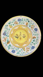 Majolica plate with plant motifs and Marian symbol. Manardi manufacture. Bassano.