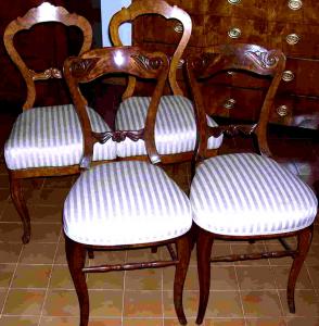 Two pairs of Biedermeier chairs, veneered in cherry wood and inlaid with maple wood. Vienna, circa 1840, late Biedermeier period.