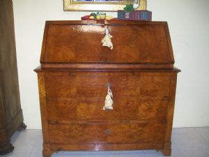 Elm drop-front desk with burr and feathered parts and solid wood parts. 114 w x 114 h x 55 d.