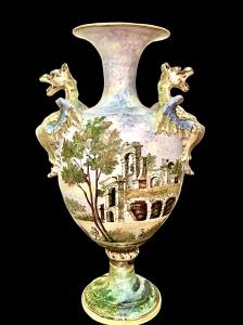 Coppia di vasi in maiolica policroma decorati a paesaggi e personaggi.Angelo Minghetti.Bologna.