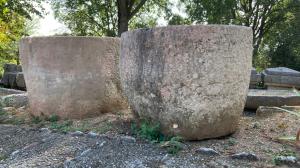 Bush-hammered marble half-moon tanks