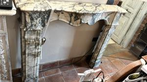 Antique Calacatta gold marble fireplace