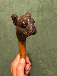 Walking stick with wooden knob depicting a dog's head. Malacca cane.
