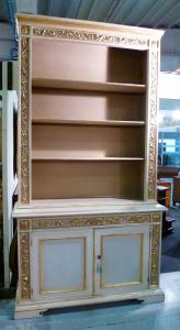Lacquered bookcase with gilded friezes