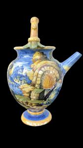 Versatoio in maiolica a decoro istoriato urbinate.