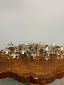 Three Maria Theresa style three-light wall sconces, early 1900s, crystal, 18x30x20cm. Good condition, complete.