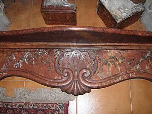 Red veined marble fireplace mantel
