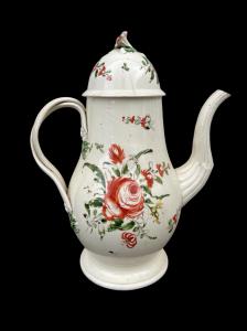 Earthenware coffee pot decorated with roses. Derbyshire, England.