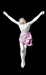 Corps du Christ en biscuit de porcelaine polychrome.