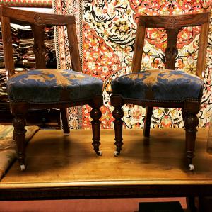 Pair of 19th-century walnut gondola chairs.