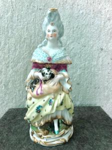 Porcelain veilleuse teapot depicting a female figure with a dog. France, Louis Philippe period.