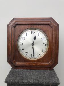 Oak wood wall clock. Art Deco period.