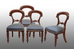 Group of four antique Victorian English solid mahogany chairs. 19th century.
