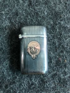 Silver matchbox with niello decoration and shield with low gold initials. Russia.