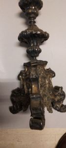 Candelliere in rame argentato e sbalzato epoca XVIII° sec. h. cm. 80