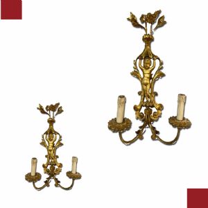 PAIR OF CARVED AND GILDED WOOD SCONCES, MID-19TH CENTURY