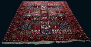 ON SALE: Decorative and charming rug from the late 1800s or early 1900s, nomadic from the Bakhtiari tribe.
