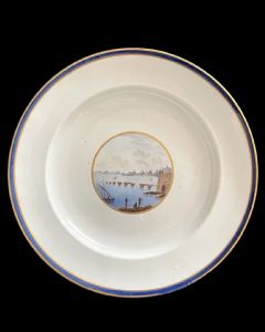 Porcelain plate with central roundel depicting a landscape scene. Inscription on the back. Ginori Doccia manufacture.