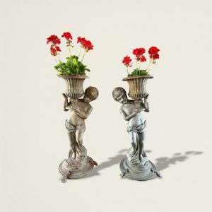 
Coppia di Fioriere in Ghisa con Putti