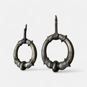 Large pair of bronze door knockers, Milan, late 17th-early 18th century