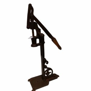 Iron bottle capper