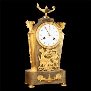 Orologio in bronzo cesellato e dorato