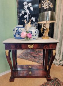Small and elegant Empire console in mahogany feather