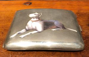 Silver and enamel cigarette case with dog figure. Italy.