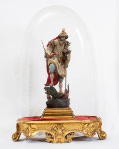 Neapolitan sculpture depicting "Saint Michael the Archangel" with a terracotta head with crystal eyes and polychrome wooden limbs. 20th century.
