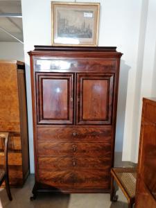 Mahogany cabinet with drawers and doors