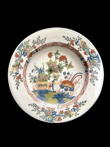 Majolica plate with oriental style decoration called: garden.Ferniani manufacture, Faenza.