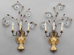 Pair of carved and gilded wooden wall lights, iron arms with beads, 19th century