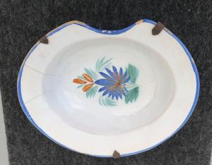 Oval shaving dish with floral decoration. France.
