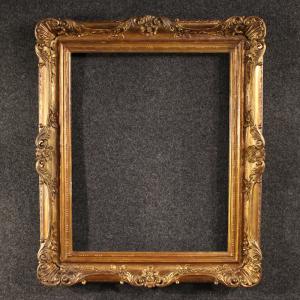 Cornice italiana scolpita e dorata del XX secolo