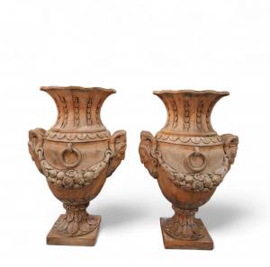 Coppia di vasi in terracotta chiara e dipinti