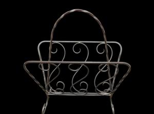 Wrought iron magazine rack.