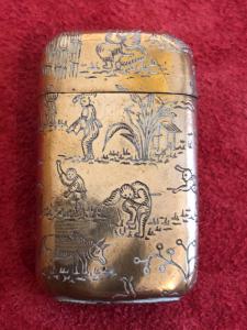 Vermeil silver matchbox without hallmark with scenes of an oriental village.