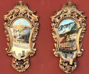 Pair of shaped golden mirrors