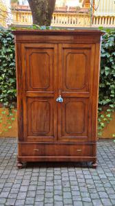 Small antique Emilian walnut veneered cupboard