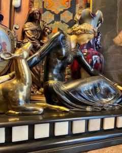 Early 20th-century bronze, 20th-century sculptor, bronze and marble group depicting a girl with a deer.